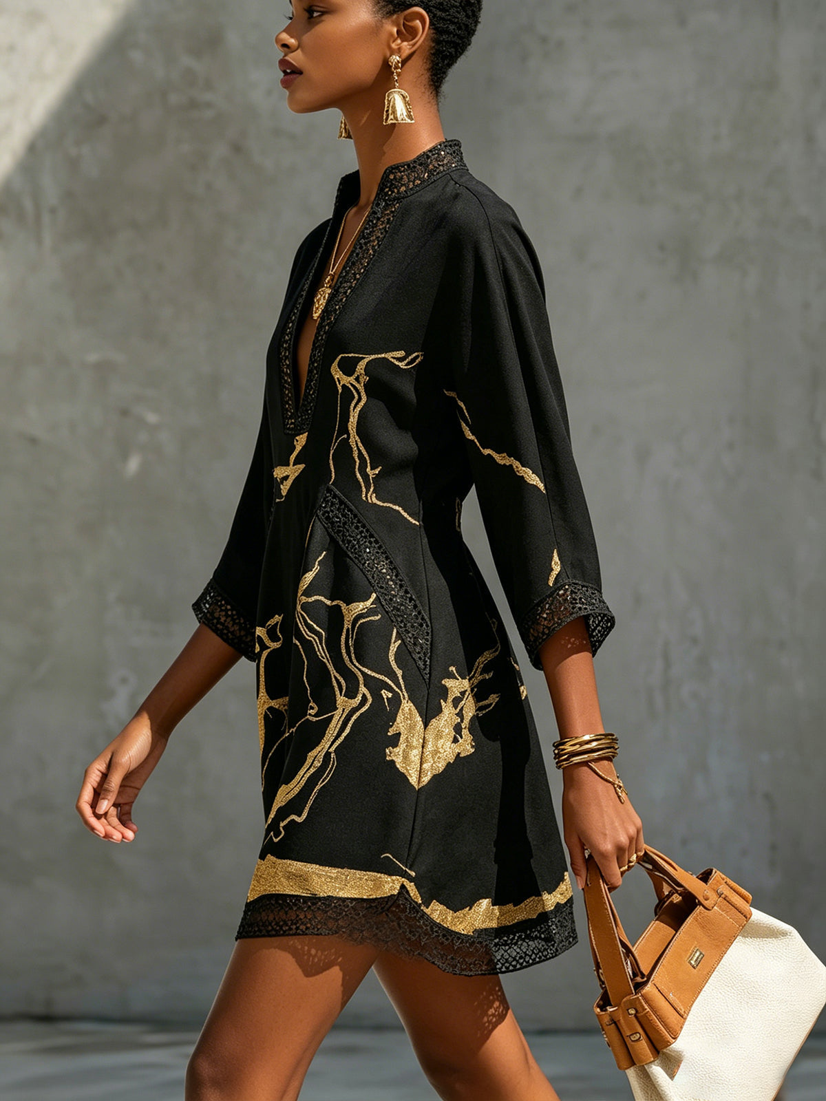 Fortuna | Vestido mini negro con bordados dorados
