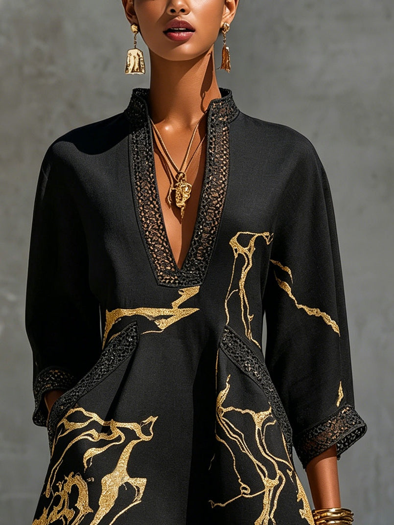 Fortuna | Vestido mini negro con bordados dorados