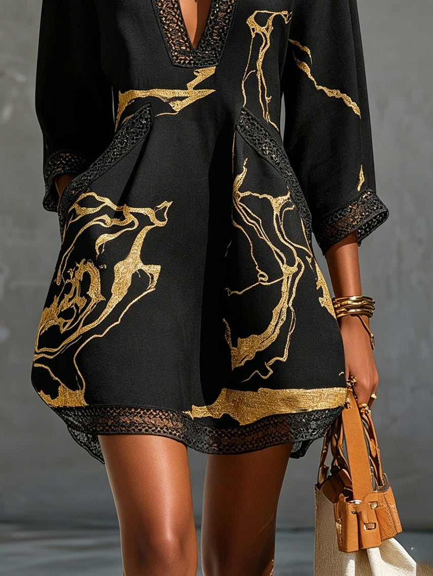 Fortuna | Vestido mini negro con bordados dorados