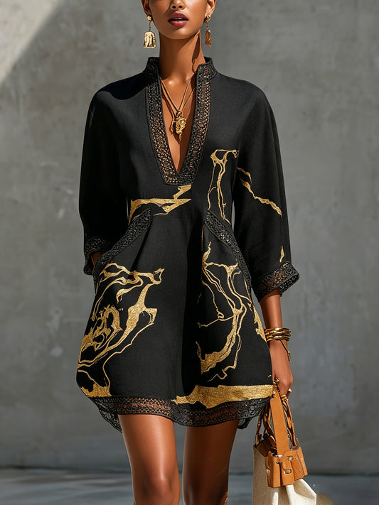 Fortuna | Vestido mini negro con bordados dorados